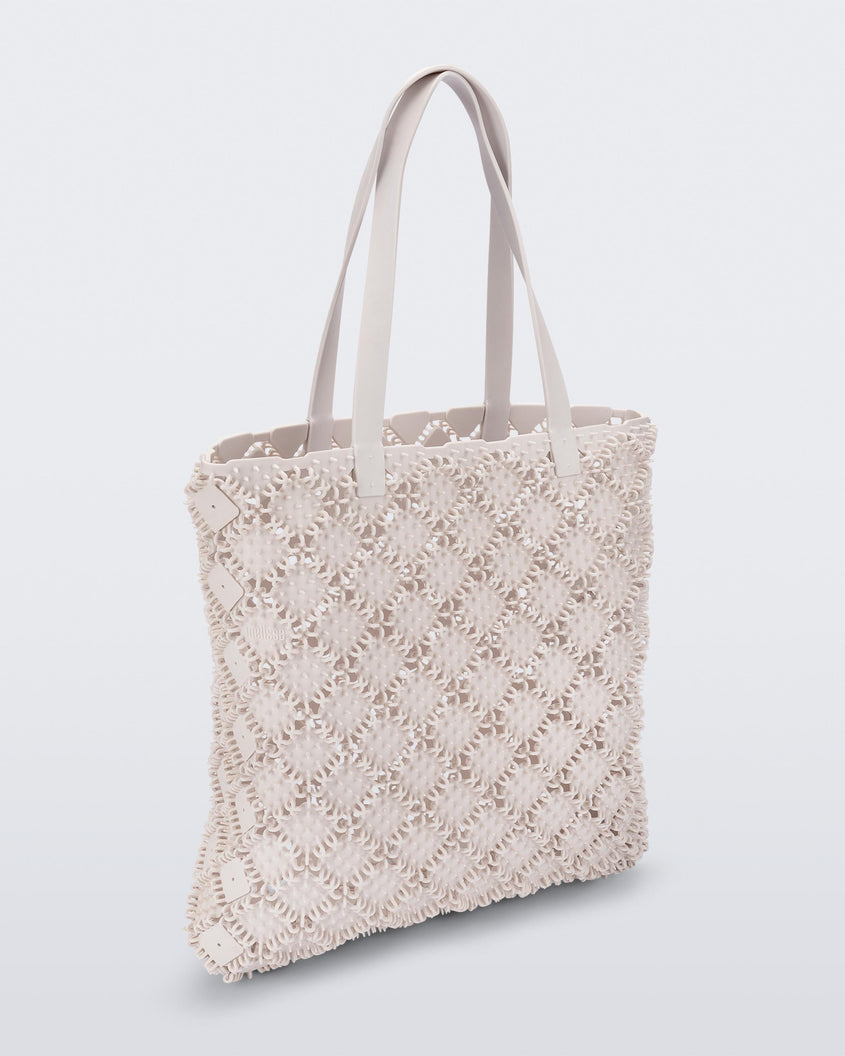 Back view of a white Melissa Mogu + Hikaru Matsumura bag