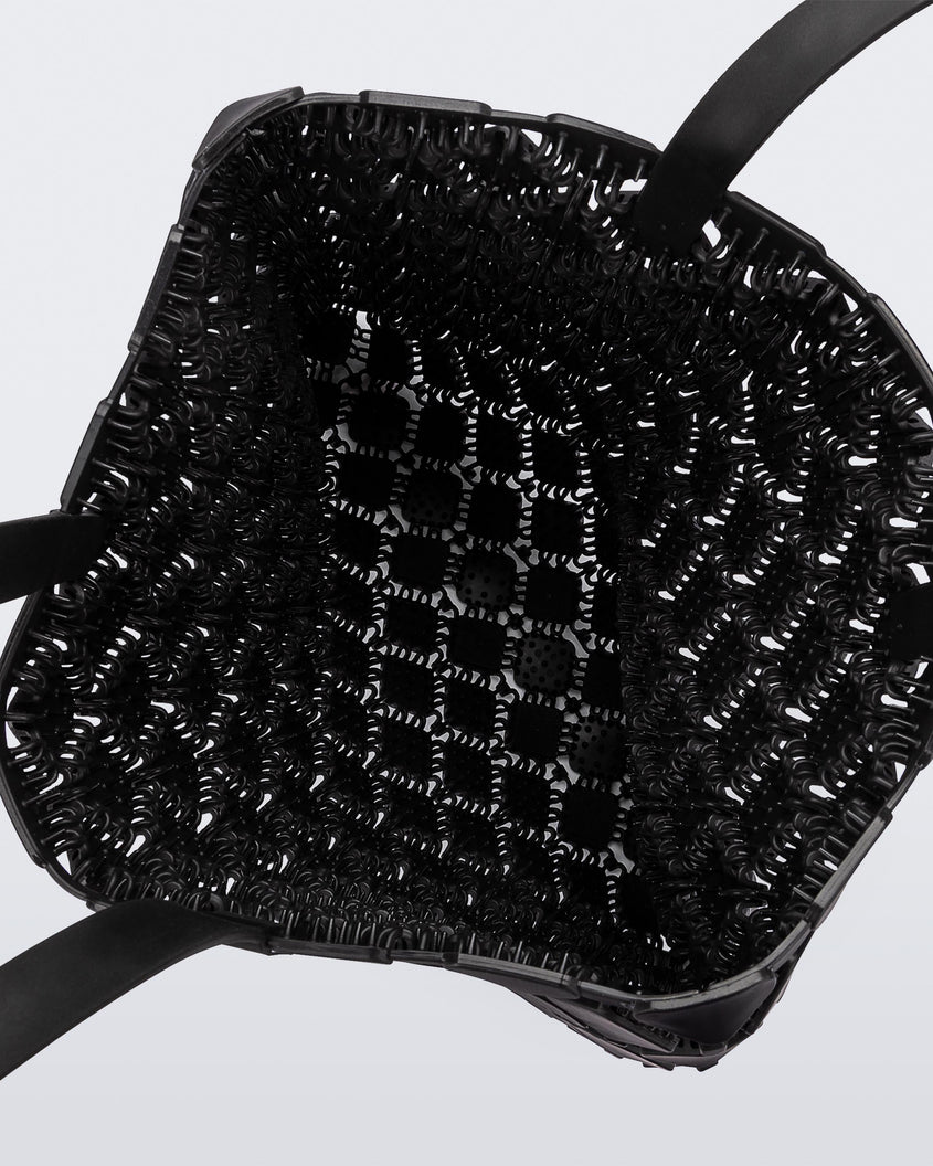 Top view of a black Melissa Mogu + Hikaru Matsumura bag