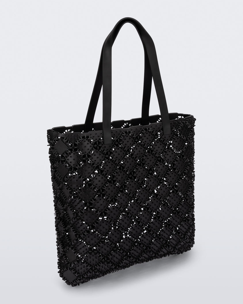 Back view of a black Melissa Mogu + Hikaru Matsumura bag
