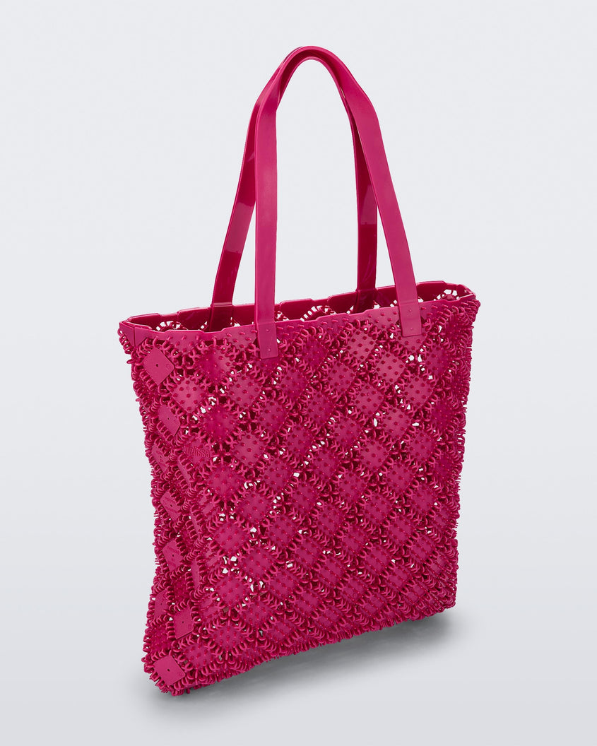 Back view of a pink Melissa Mogu + Hikaru Matsumura bag