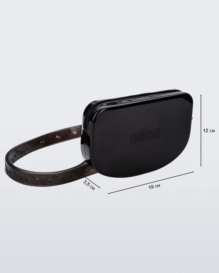 Angled view of the black Melissa Go Easy Bag with strap with bag dimensions 19 cm length, 3.5 cm width, and 12 cm height.