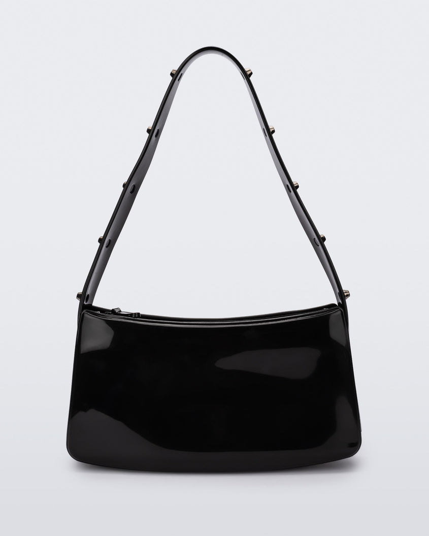 Back view of the black Melissa Baguete Studs bag with a short studded strap.