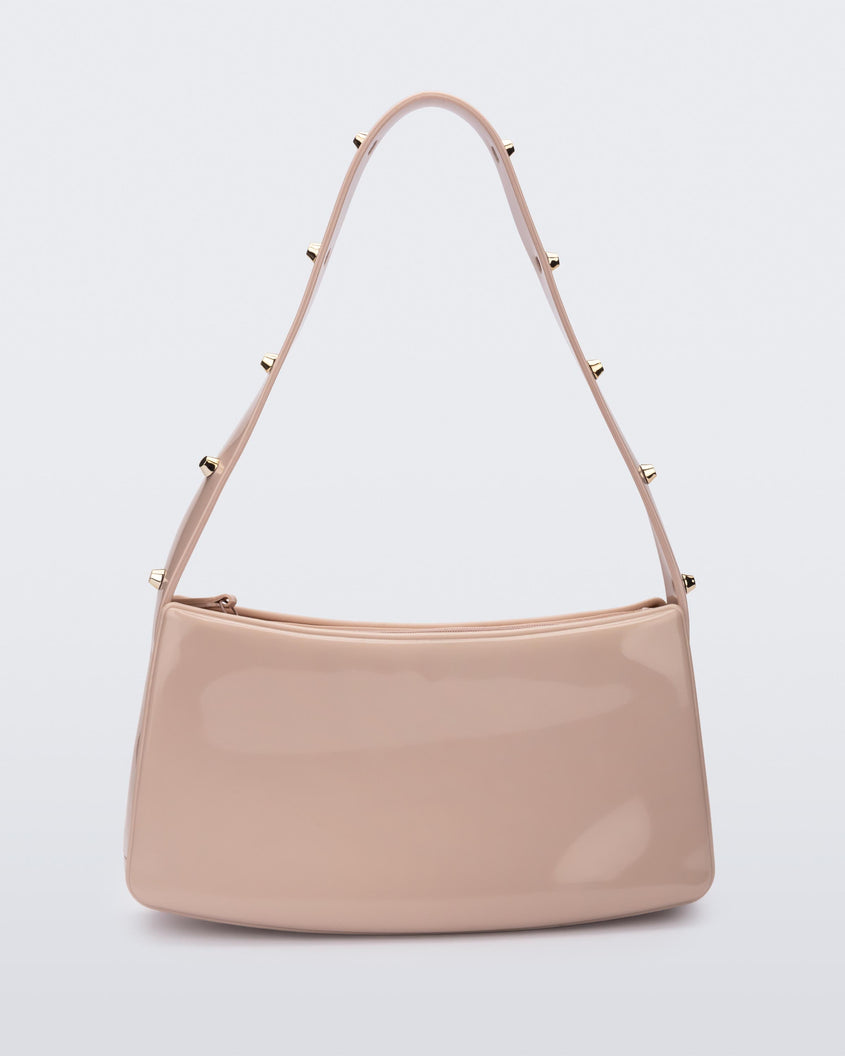 Back view of the pink Melissa Baguete Studs bag with a short studded strap.