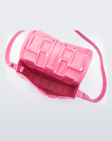 Inside view of a pink Possession Bag with strap.
