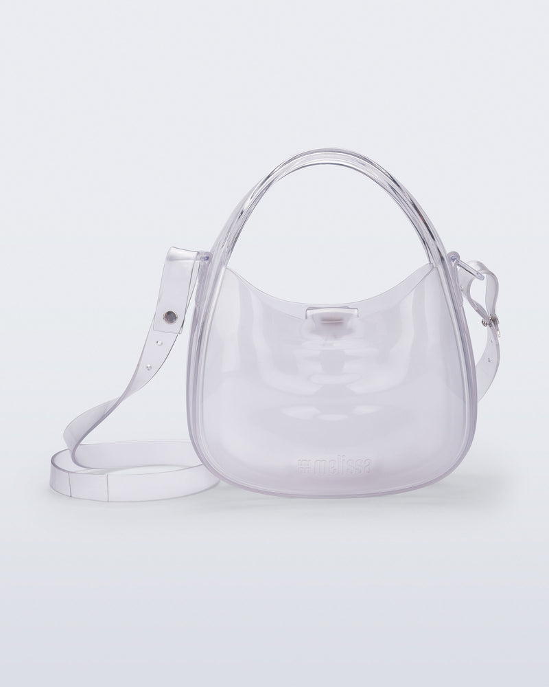 Front view of a clear Mirror bag with cross body straps two clear handles.