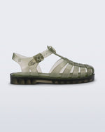 Side view of a transparent green Possession kids sandal