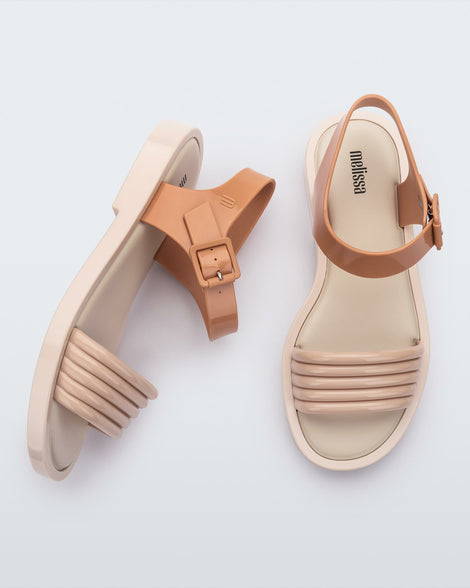 Side and top view of a pair of beige Mar Wave women's sandals.