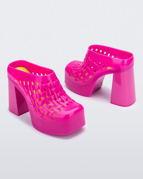 Angled view of a pair of pink Clog Boots + Marshall Columbia with the shaft removed