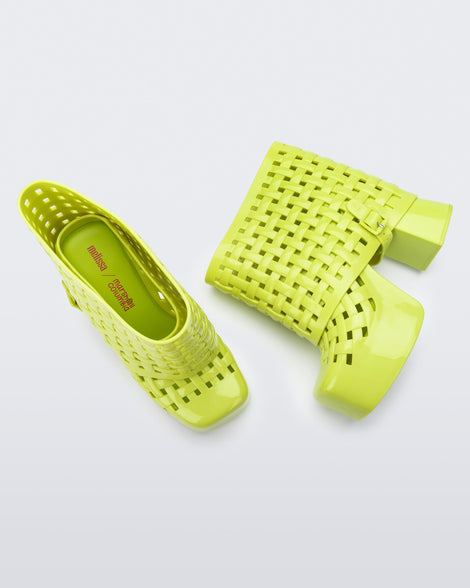 Top and side view of a pair of green Marshall Columbia Clog platform Boots.
