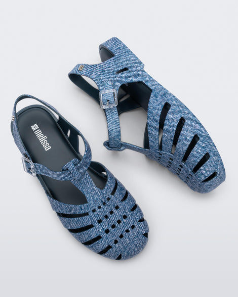 Top and side view of a pair of blue jean Possession sandals
