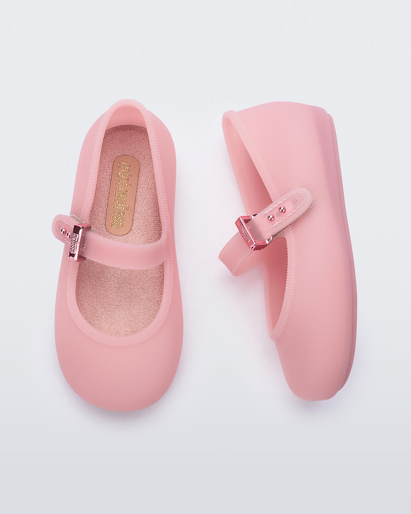 Top and side view of a pair of milky pink Soft ballerina baby flats