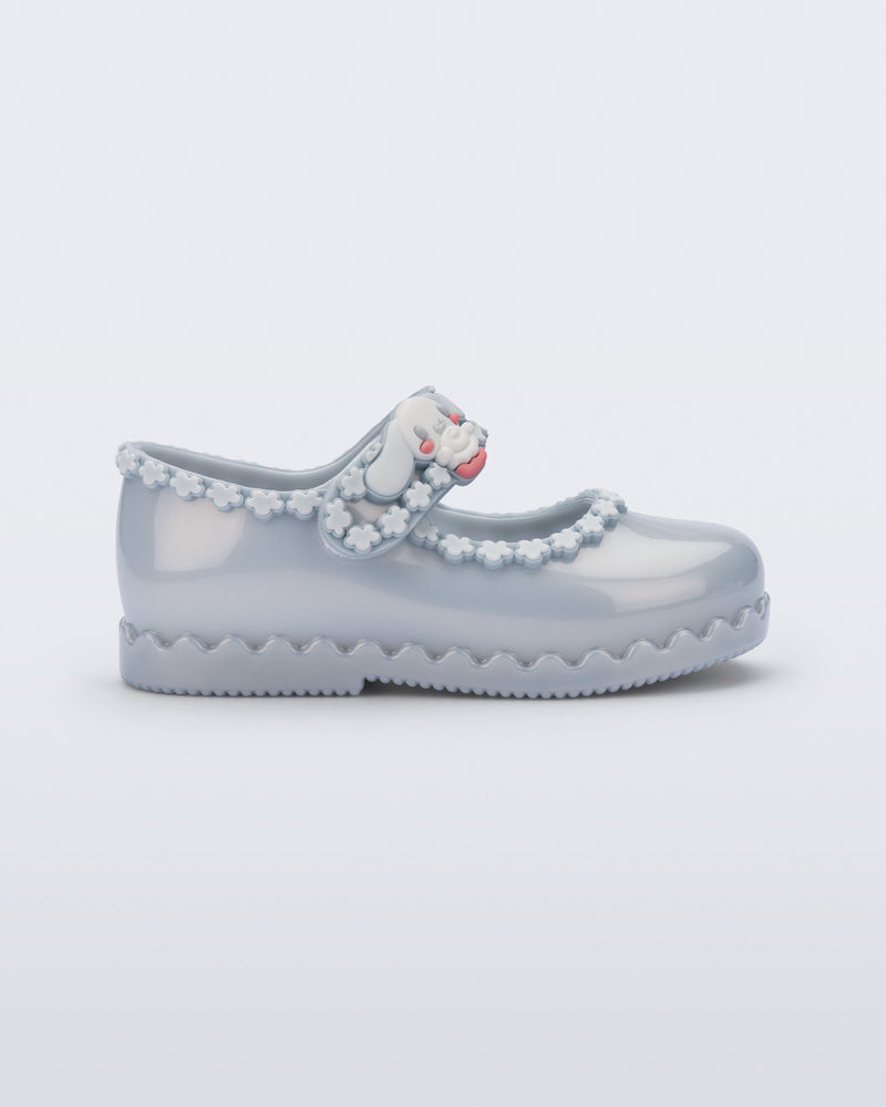 Side view of a pearly blue Hip Ballerina + Hello Kitty baby flat