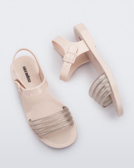 Side and top view of a pair of beige Mar Wave kids sandals.