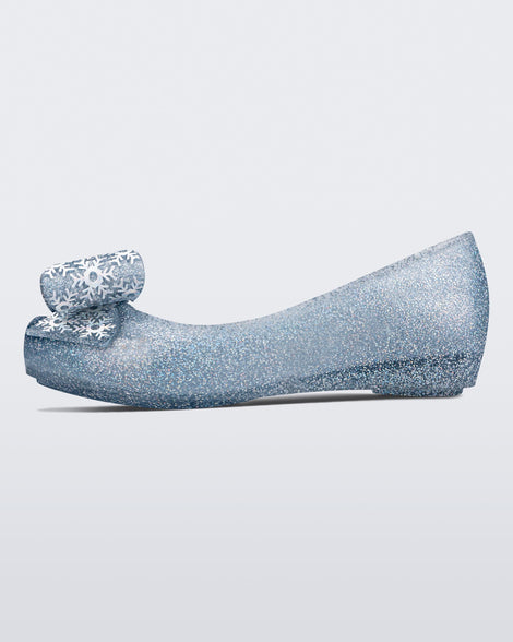 Inner side view of a blue/glitter kids Ultragirl Frozen flat.