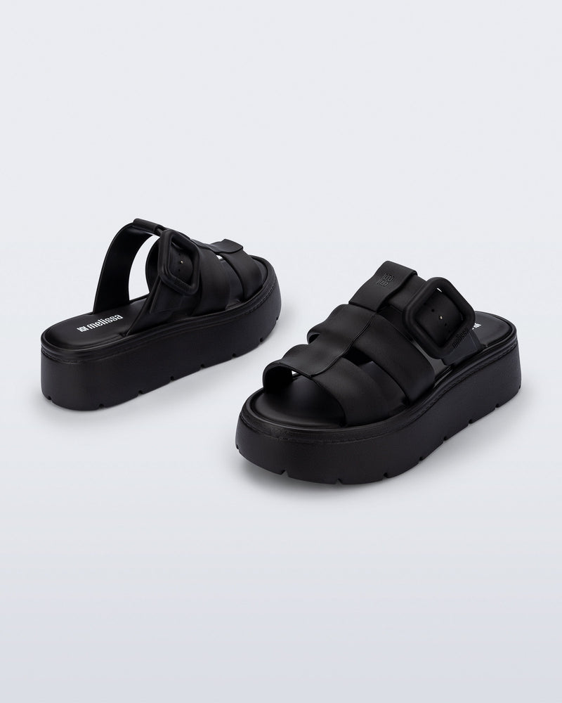 Back and angled view of a pair of black Pump Platform sandals
