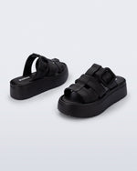 Back and angled view of a pair of black Pump Platform sandals