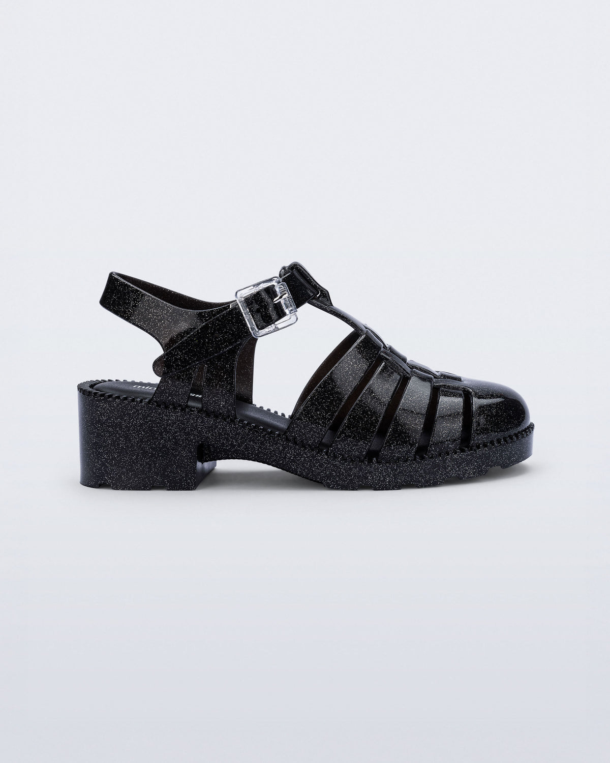 Side view of a pearly black Possession Heel kids fisherman sandals