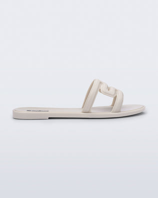 Product element, title M Slide in Beige
 price $59.00