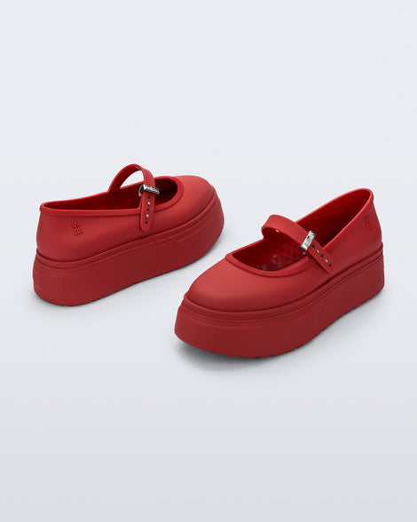 Back and side angled view of a pair of red Soft Ballerina Platform flats