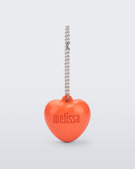 Front view of an orange Heart Charm