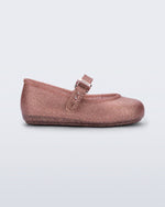 Side view of a glitter pink Soft Ballerina baby flat