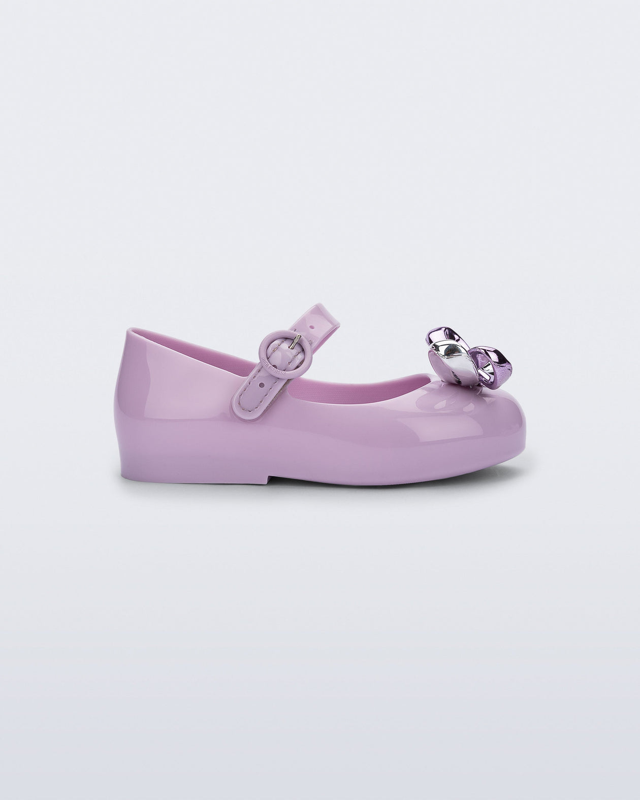 Side view of a lilac Sweet Love Glam baby ballerina with bow
