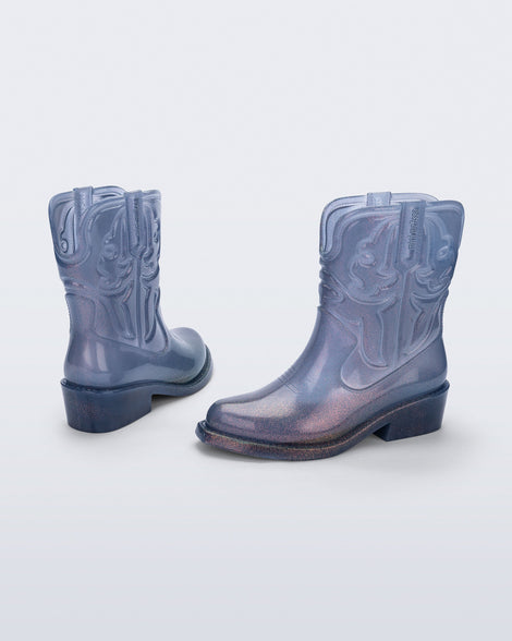 Back and side view of a pair of glitter blue Texas kids boots