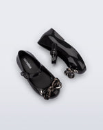 Top and side view of a pair of black Sweet Love Glam baby ballerinas with bow