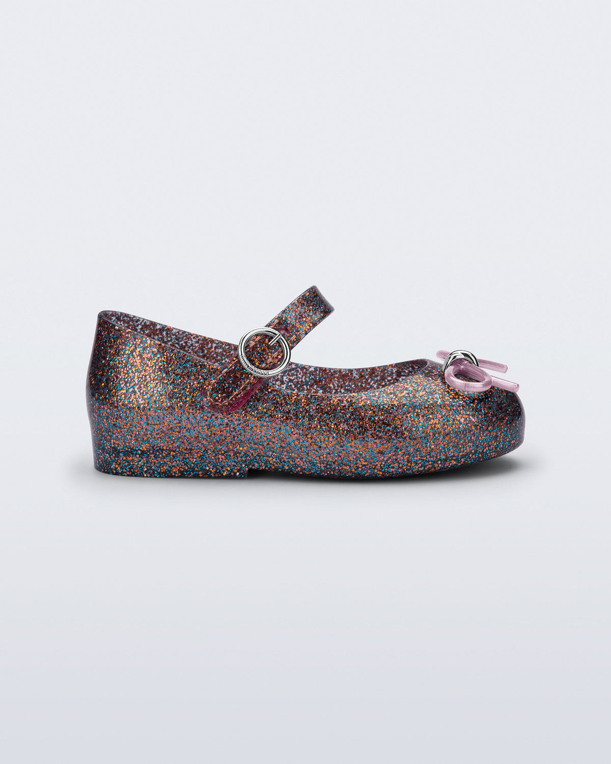 Side view of a glitter clear pink baby Sweet Love flat