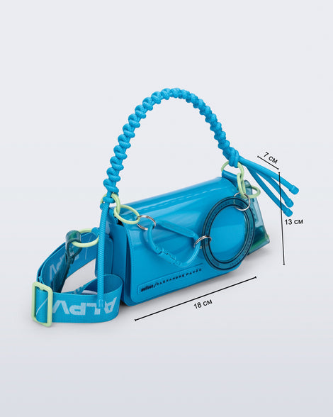 Angled view of an blue Olga Bag + Alexandre Pavao with short strap fabric long strap. With purse dimensions of 18cm x 7cm x 13cm