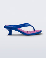 Side view of a blue Flip Flop Kitten Heel with pink insole