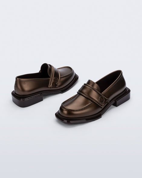 Back and angled view of a pair of bronze Spencer loafers