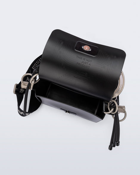 Top view of an black Olga Bag + Alexandre Pavao with short strap fabric long strap