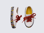 Side and top view of a pair of white Street Mickey & Friends baby sneaker with red shoe laces