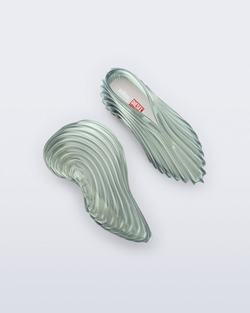 Top and side view of a transparent green Quantum Sneaker + Diesel