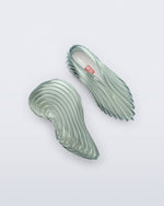 Top and side view of a transparent green Quantum Sneaker + Diesel