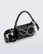 Angled view of an black Olga Bag + Alexandre Pavao with short strap fabric long strap