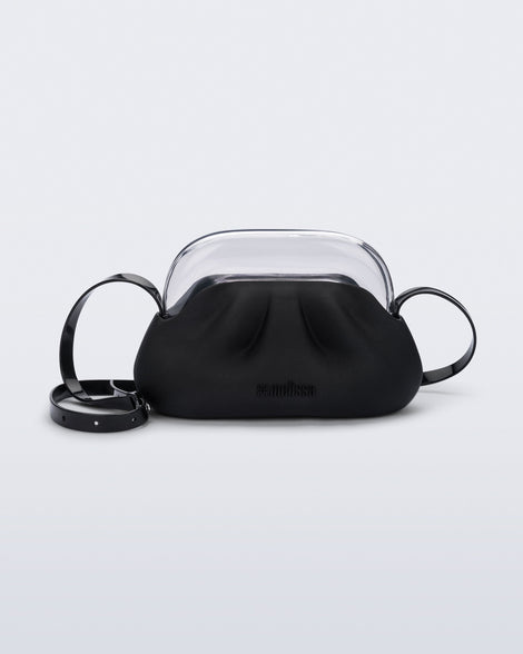 Front view of a small black bag with clear clutch and long strap