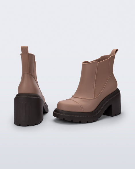 Back and side view of a pair of brown Courtney boots with dark sole.