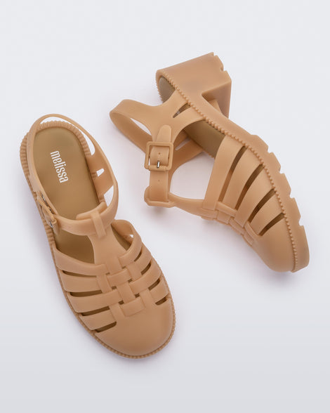 Side and top view of a pair of beige Possession Heel women's fisherman style sandals.