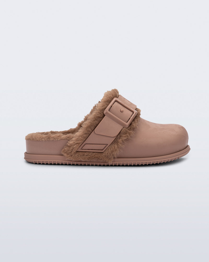 Side view of a brown Cozy Warm clog with fuzzy insole