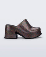 Side view of a mixed glitter Mia mule with black sole