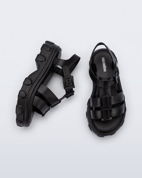 Top and side view of a pair of black Ella kids sandals