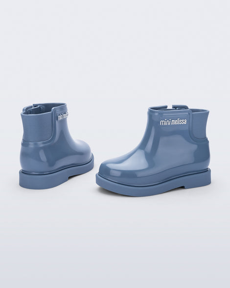 Back and side view of a pair of blue Chelsea II baby boots
