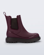 Side view of a burgundy Noir Boot with brown sole