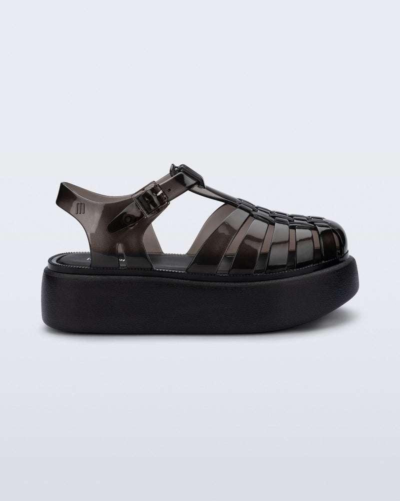 Side view of a black Possession Platform kids fisherman sandal