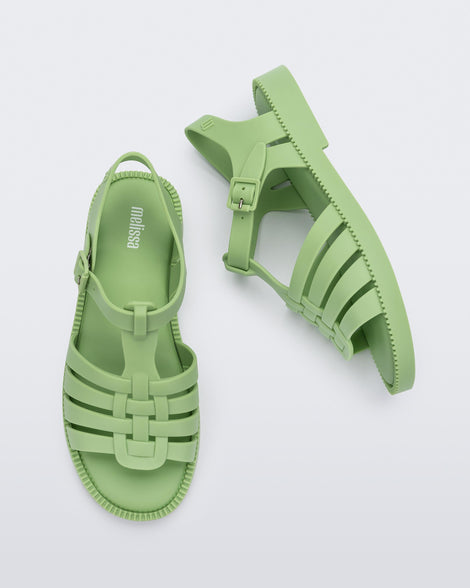 Top and side view of a pair of matte green Possession Fresh fisherman style sandals with open toe.
