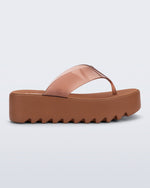 Side view of a brown Thong Platform flip flop