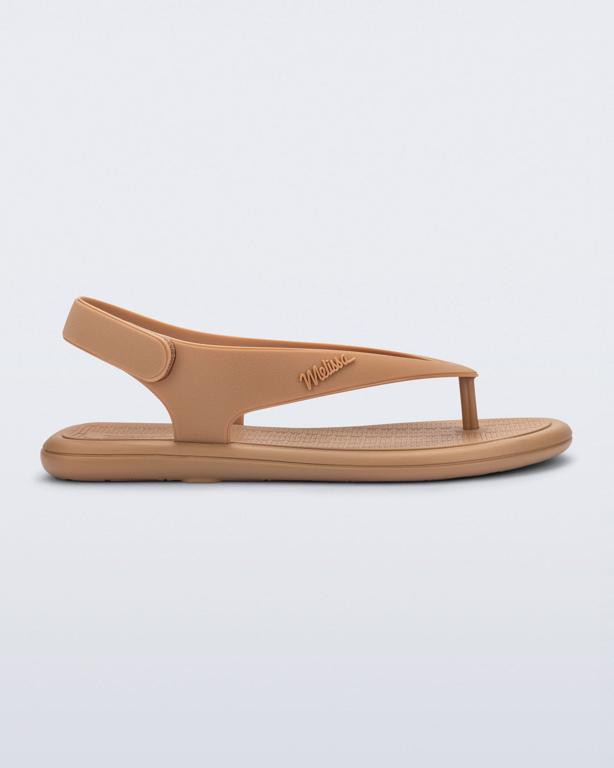 Side view of a dark beige Sun Samba thong sandal