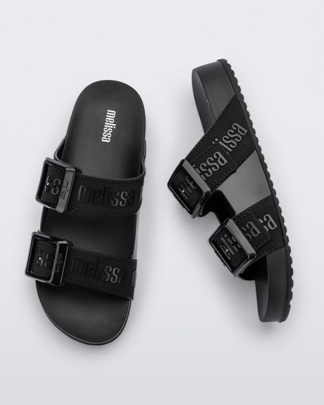 Top and side view of a pair of black Cozy M Love adult slides